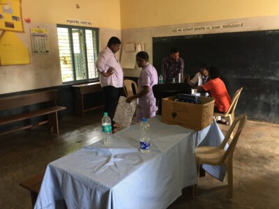 The table in the foreground has seats for 2 doctors and 2 patients